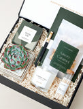 Open gift box filled with curated gifts.