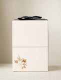 Cream-colored rectangular gift box topped with a black ribbon, featuring a delicate autumn floral illustration. - Image 