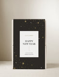 New Year's Petite Zebra Garden succulent box featuring a black sleeve with gold and white star patterns on a light background. - Image 