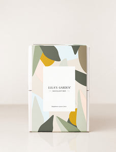Gift box wrapped in “Lula’s Garden” sleeve.