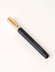 Gold and black ink pen.